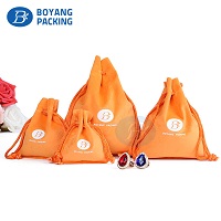 Orange velvet pouches wholesale, velvet drawstring bag suppliers
